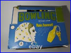 Vintage 1950s Full Case Store Display Colorful Bowling Pin Rain Bonnet Keychains