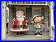 Vintage-Apple-Store-Life-Size-Santa-Clause-and-Elf-Window-Display-01-mvux