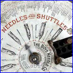 Vintage BOYE NEEDLES & SHUTTLES Metal Spinning Store Display with 1 Filled Shuttle