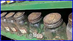 Vintage Fold Up Country Store Seed Display Cabinet w 33 Seed Jars Circa 1930