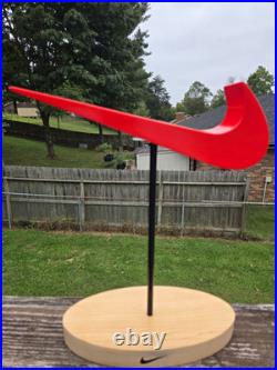 Vintage Nike Red Swoosh Advertising Store Display Stand with Natural Wood Base
