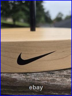 Vintage Nike Red Swoosh Advertising Store Display Stand with Natural Wood Base