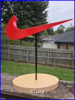 Vintage Nike Red Swoosh Advertising Store Display Stand with Natural Wood Base