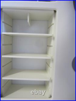 Vintage estee lauder Perfume 4 items store Display. With items included brushes