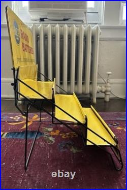 Vintage yellow metal RCA Radio Batteries store display rack