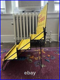 Vintage yellow metal RCA Radio Batteries store display rack